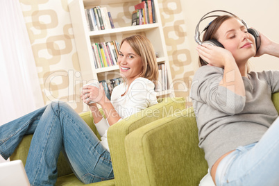 Students - Two female teenager relaxing in lounge