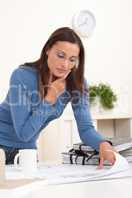 Young businesswoman working at the office