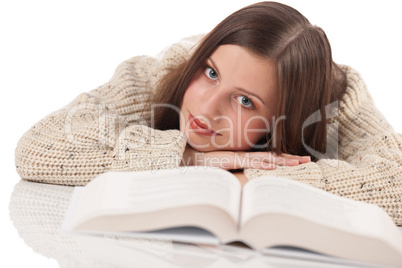 Portrait of young happy woman with book