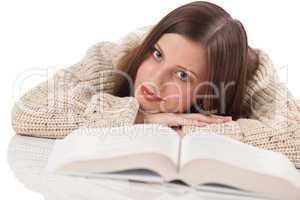 Portrait of young happy woman with book