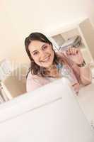 Young executive woman with bottle of water at office