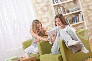 Students - Two female students studying in lounge