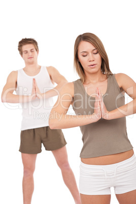 Fitness - Young healthy couple in yoga position