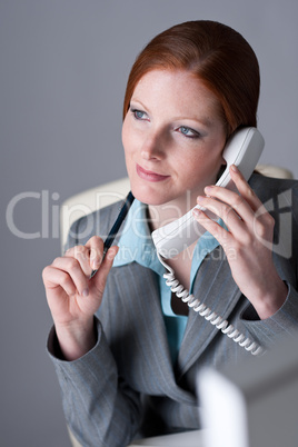 Successful executive businesswoman on the phone