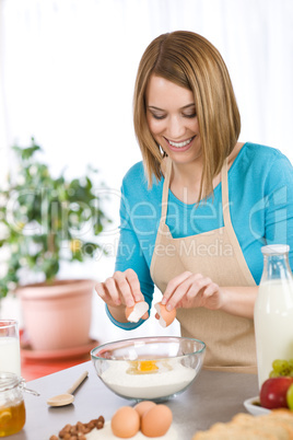 Baking - Smiling woman with healthy ingredients