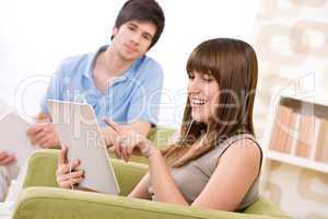 Student - teenage woman with touch screen tablet computer