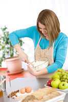 Baking - Smiling woman with healthy ingredients