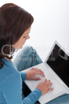 Brown hair woman with laptop