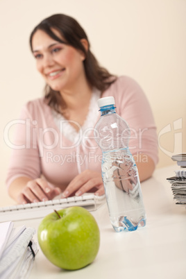 Young businesswoman working at office