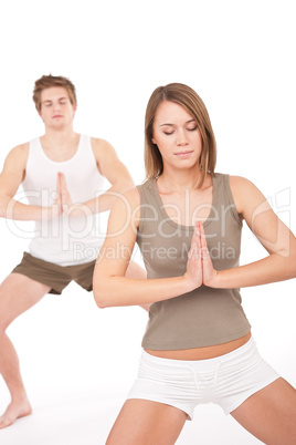 Fitness - Young healthy couple in yoga position