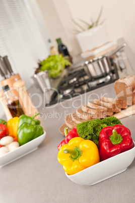 Bowl with vegetable in modern kitchen