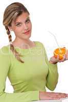 Healthy lifestyle series - Woman holding orange with straw