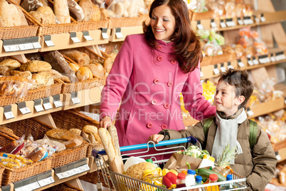 Grocery store shopping - Smiling woman with child