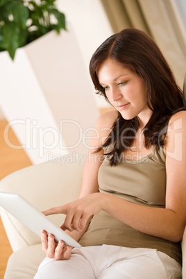 Young woman with touch screen tablet computer