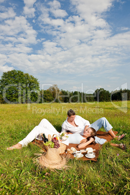 Picnic - Romantic couple in spring nature