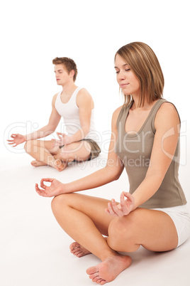 Fitness - Healthy couple stretching in yoga position