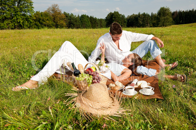 Picnic - Romantic couple in spring nature