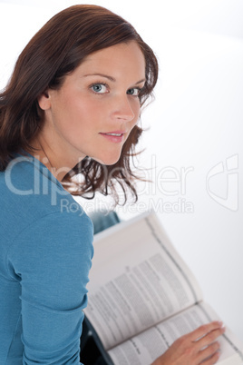 Smiling happy woman with book