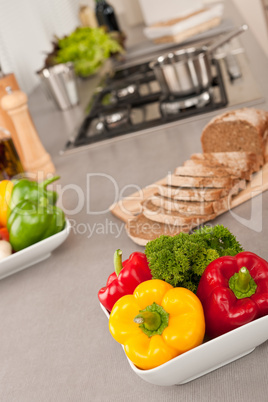 Bowl with vegetable in modern kitchen