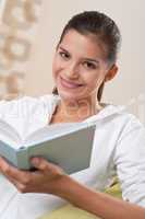 Students - Female teenager reading book