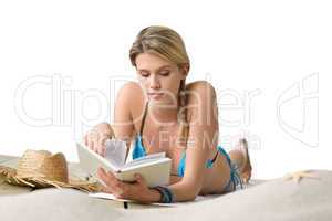 Beach - Young woman relax in bikini with book