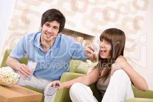 Student - happy teenagers watching television