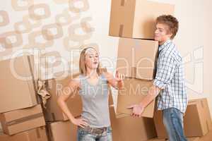 Moving house: Man and woman with box