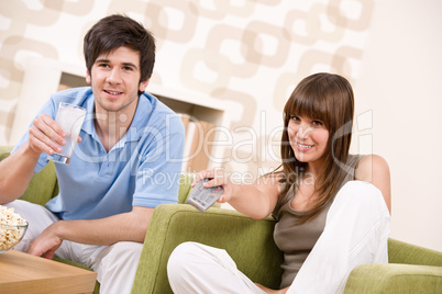 Student - happy teenagers watching television