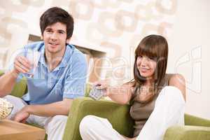 Student - happy teenagers watching television