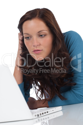 Happy woman with laptop watching screen