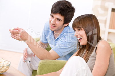 Student - happy teenagers watching television