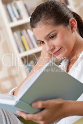 Students - Female teenager reading book