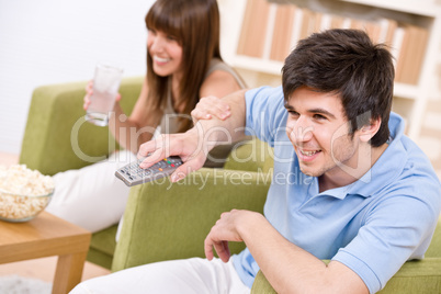 Student - happy teenagers watching television