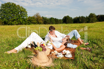 Picnic - Romantic couple in spring nature