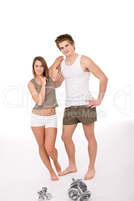 Fitness - Young healthy couple with weights