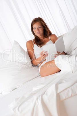 White lounge - Woman holding white book