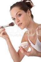 Body care series - Young woman applying powder