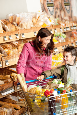 Grocery store shopping - Woman with child in winter outfit