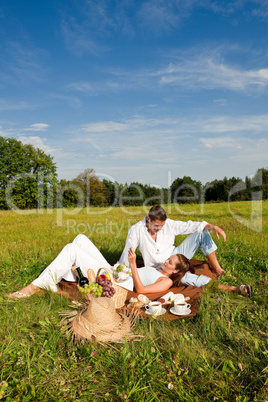 Picnic - Romantic couple in spring nature