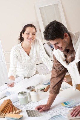 Two interior designer working at office with color swatch