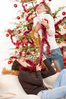 Two young woman having fun with Christmas decoration