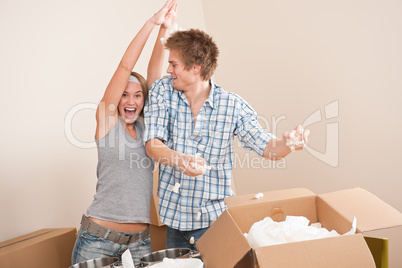 Moving house: Man and woman having fun