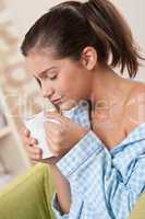 Students - Female teenager having cup of coffee
