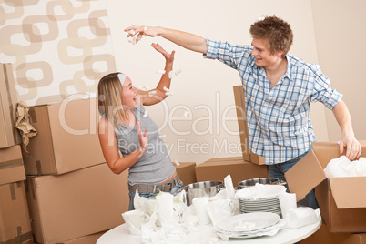 Moving house: Man and woman having fun