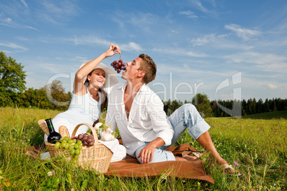 Picnic - Romantic couple in spring nature