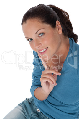 Smiling happy young woman in turquoise vest