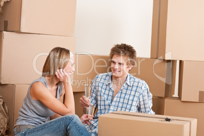 Moving house: Happy man and woman celebrating