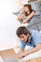 Student - Two teenager with laptop and headphones
