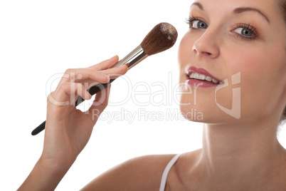 Body care series - Beautiful young woman applying powder