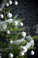 Silver decorated Christmas tree with balls and chains